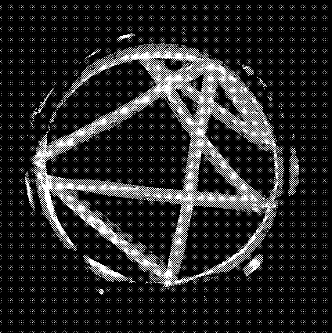 a white logo for the band PROXIMITY on a black background; the image texture is a halftone screen bitmap; the logo is a circle with imprinted artifacts at the edges and two overlapping zig zags stretching from edge to edge of the circle at odd angles
