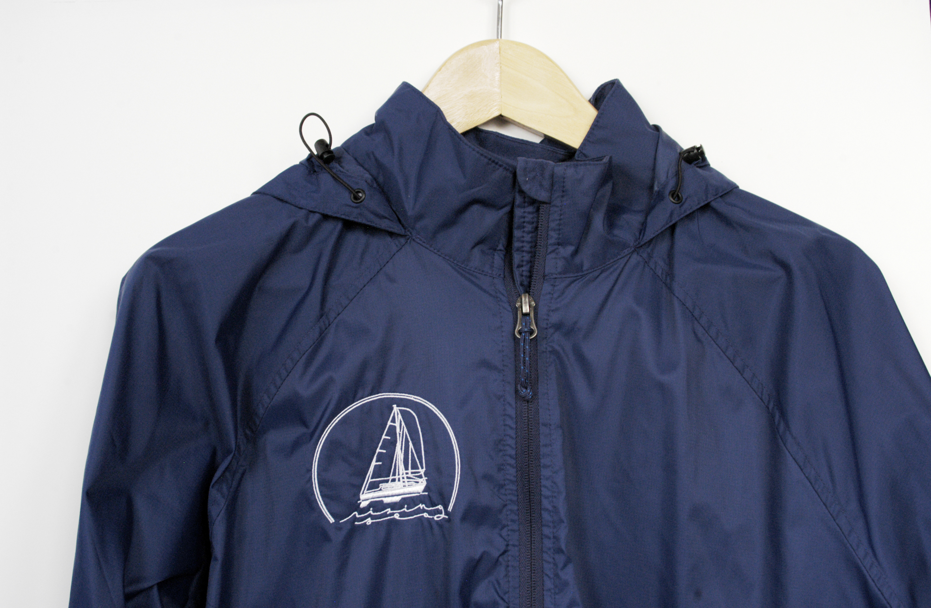 Windbreaker with embroidered boat logo
