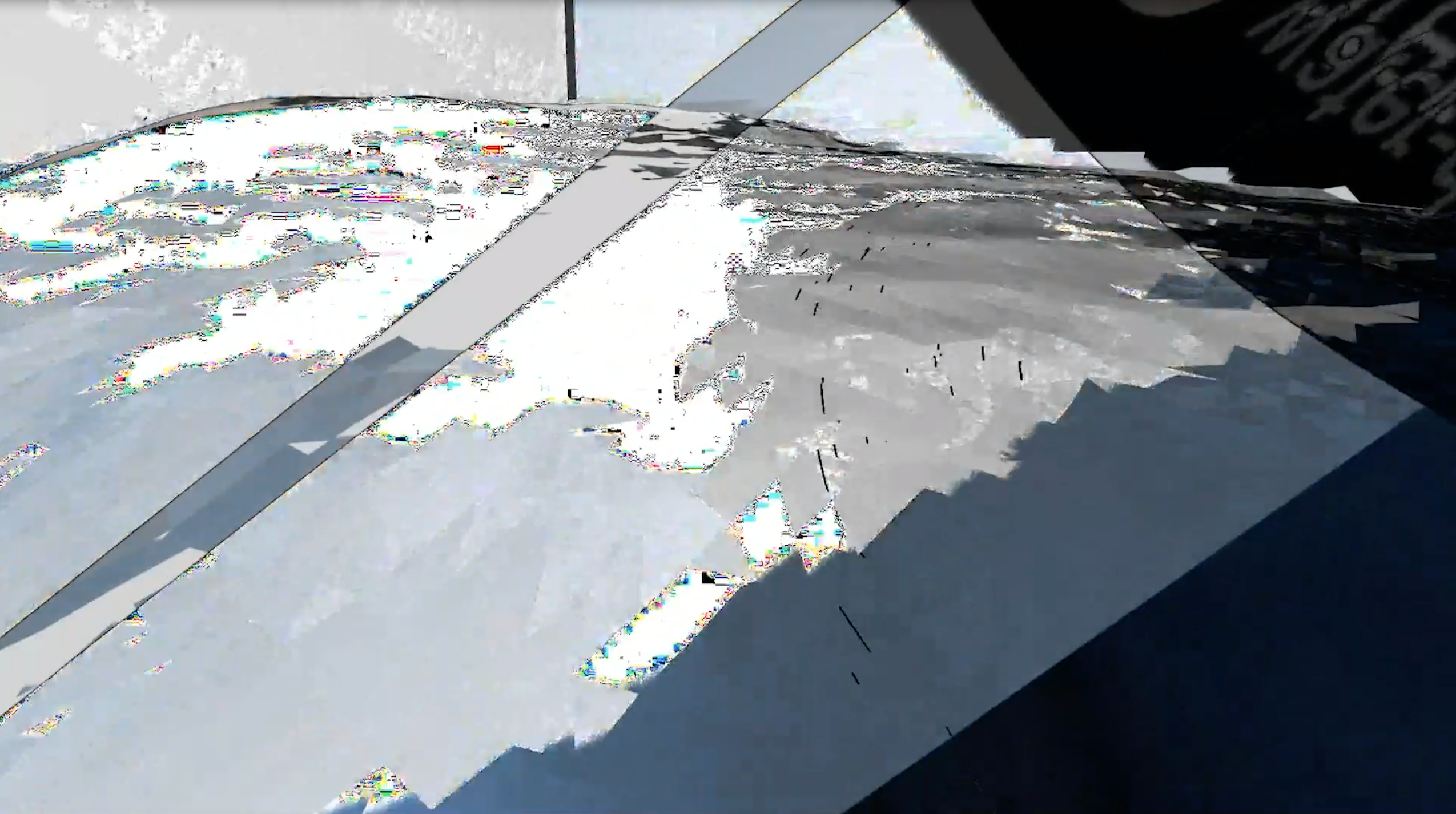 a 3D rendered surface with black and dark blue triangles in the upper and bottom right corners, meeting in the middle of the right edge; the 3D rendered surface is grainy and has pixelated rbg artifacts on the edges of the highlighted portions of the plane; the right part of the image, the part without the dark triangles, is mostly white, grey, and blue-grey and has a grey, diagonal bar starting from the top center and going down to the bottom left corner; in the top right corner, barely visible, backwards, and upside down is the word water; some other illegible text overlays are here and there